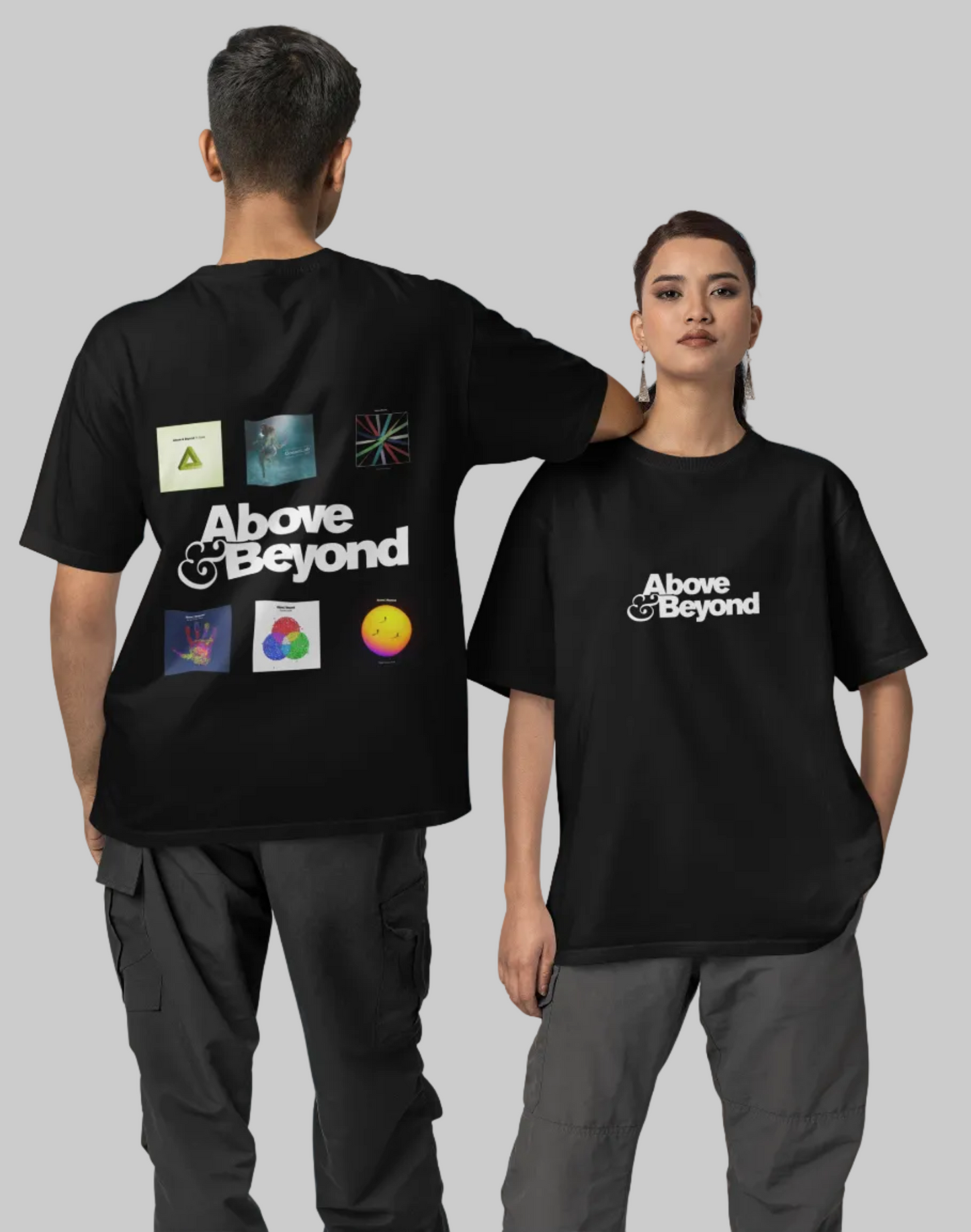 Two people wearing black t-shirts with 'Above & Beyond' logo on a blue background