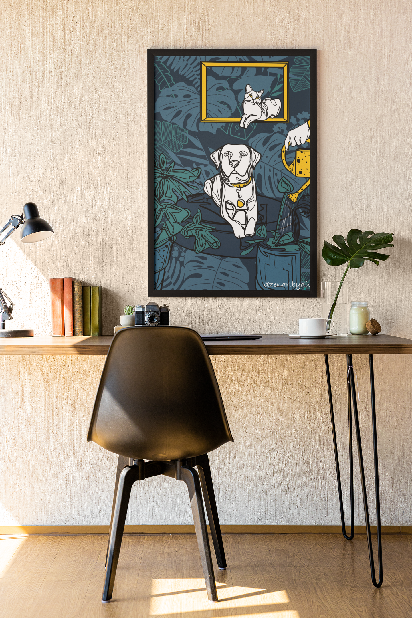 Framed abstract artwork of a white cat in a golden frame and a dog with a watering can on a dark blue botanical background above a modern wooden desk