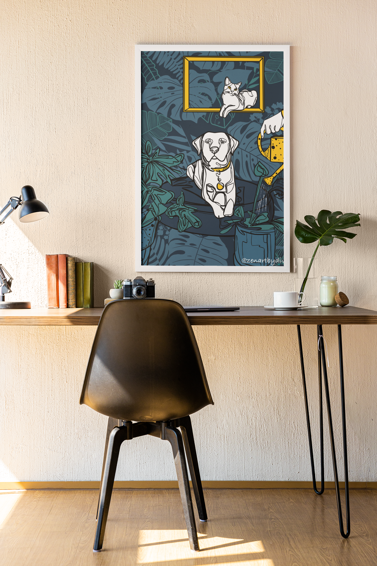Modern office desk with black chair, lamp, books, camera, and framed abstract pet artwork featuring cat and dog