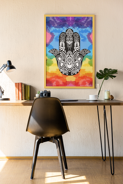 Wall art of black Hamsa hand with intricate patterns on rainbow watercolor background in modern workspace